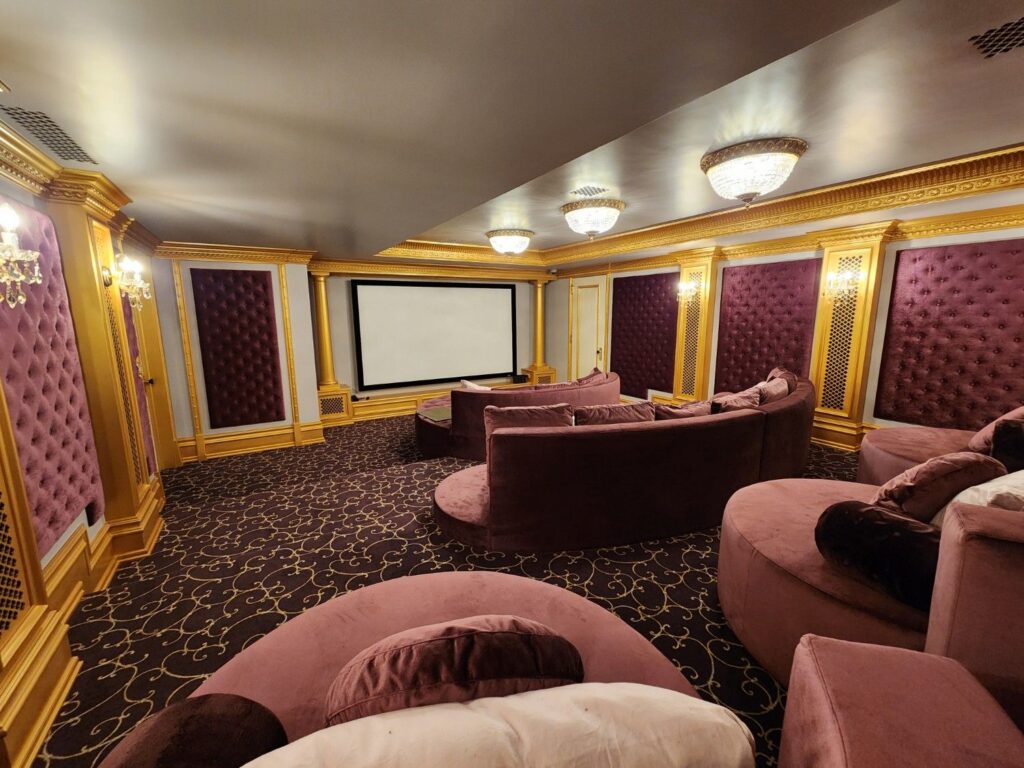 Elegant decor accents in home theater by Andrea D'Alessio